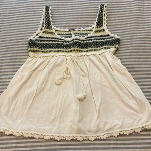 Free People fair isle sweater top/vest. Soft sweater top has tie with pom poms S